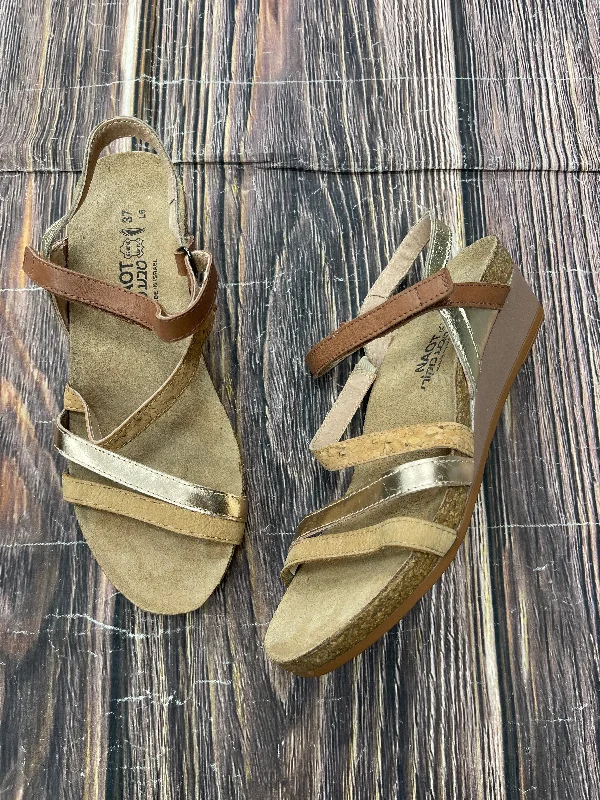 Comfortable yet fashionable women's shoesBrown Sandals Heels Wedge Naot, Size 6