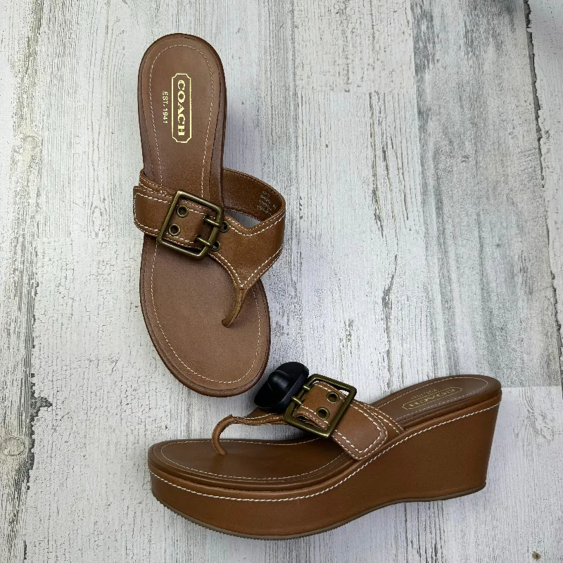 Exotic and bold women's shoe designsSandals Heels Wedge By Coach  Size: 9