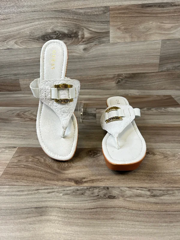 Sleek and modern women's footwear optionsSandals Heels Wedge By Guess  Size: 11.5