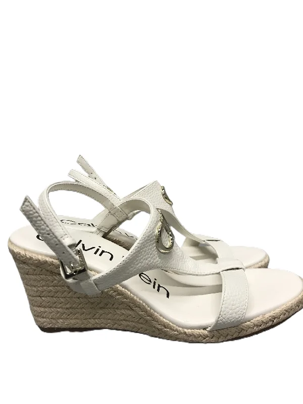 Stylish and elegant women's shoes for weddingsWhite Sandals Heels Wedge By Calvin Klein, Size: 8