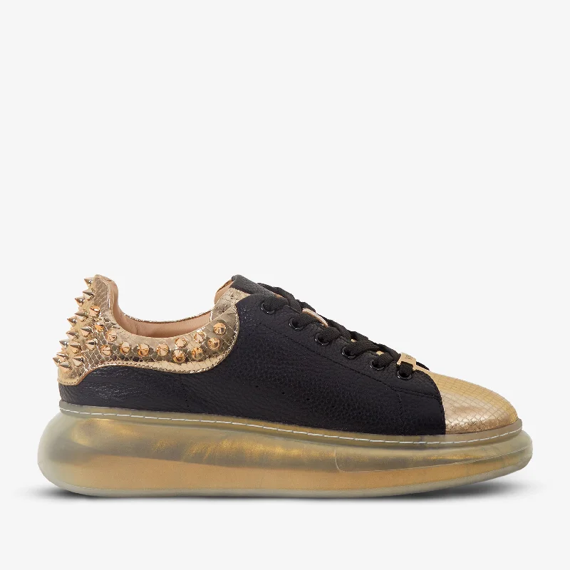 Classic and timeless women's footwear choicesThe Venezia Gold & Black Leather Women Sneaker