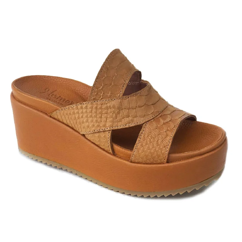 Stunning and eye-catching women's footwearEmbossed Slide Wedge Sandal In Rust