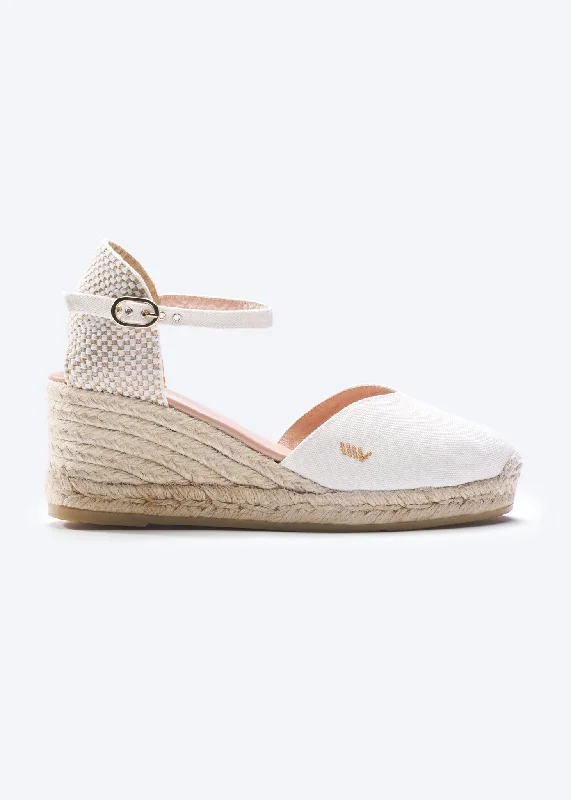 Elegant and refined women's shoe designsReus Limited Edition Canvas Espadrille Wedges