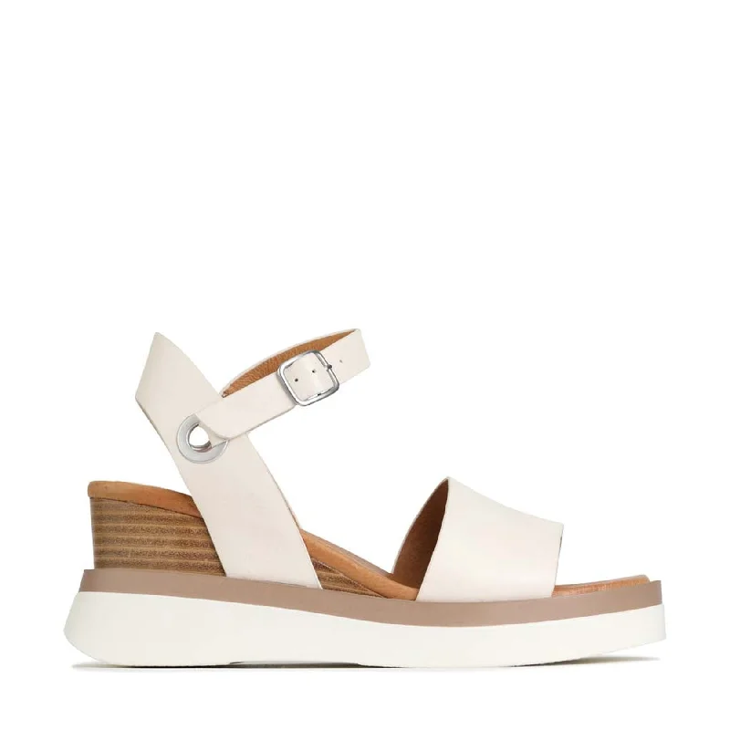 Elegant and sophisticated women's shoes for dinner datesSASKIA STRAP WEDGE SANDALS LEATHER
