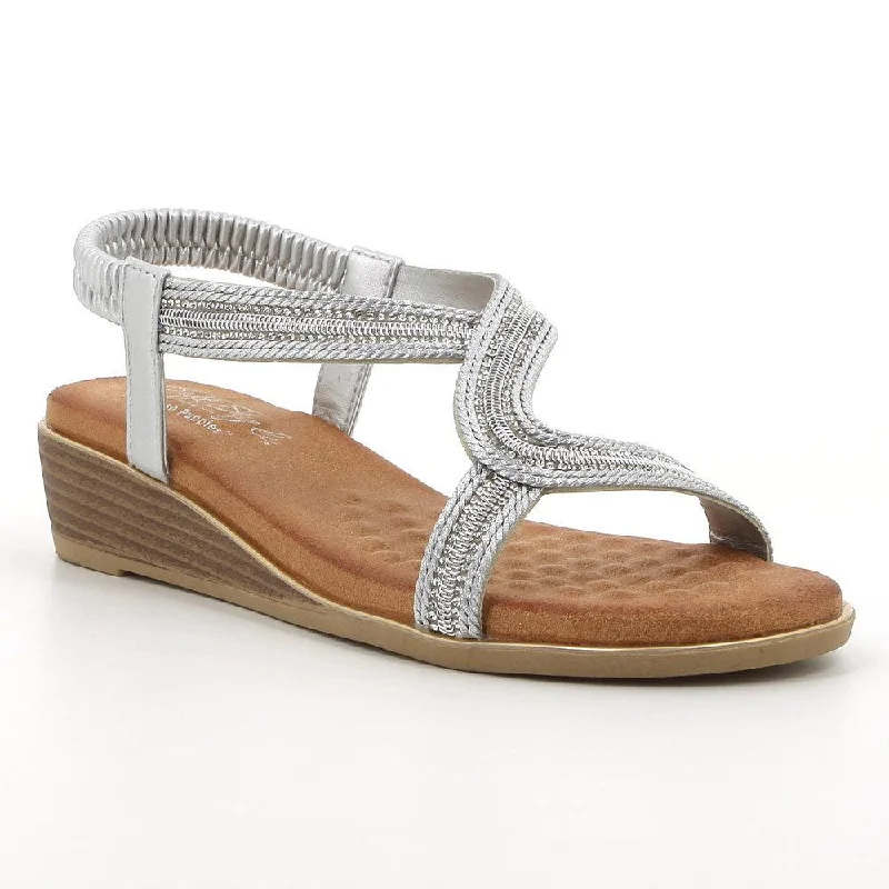 Exotic and bold women's shoe designsSoft Style by Hush Puppies Naila Sandal - Silver Exotic and bold women's shoe designsSoft Style by Hush Puppies Naila Sandal - Silver